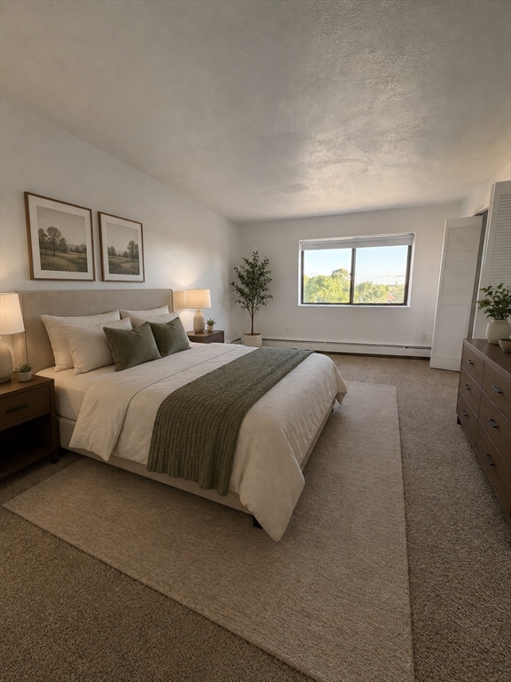 2 Victory Road, Unit 38 Lynn, MA 01902 - Photo 6 of 10 a bedroom with a bed and a night stand