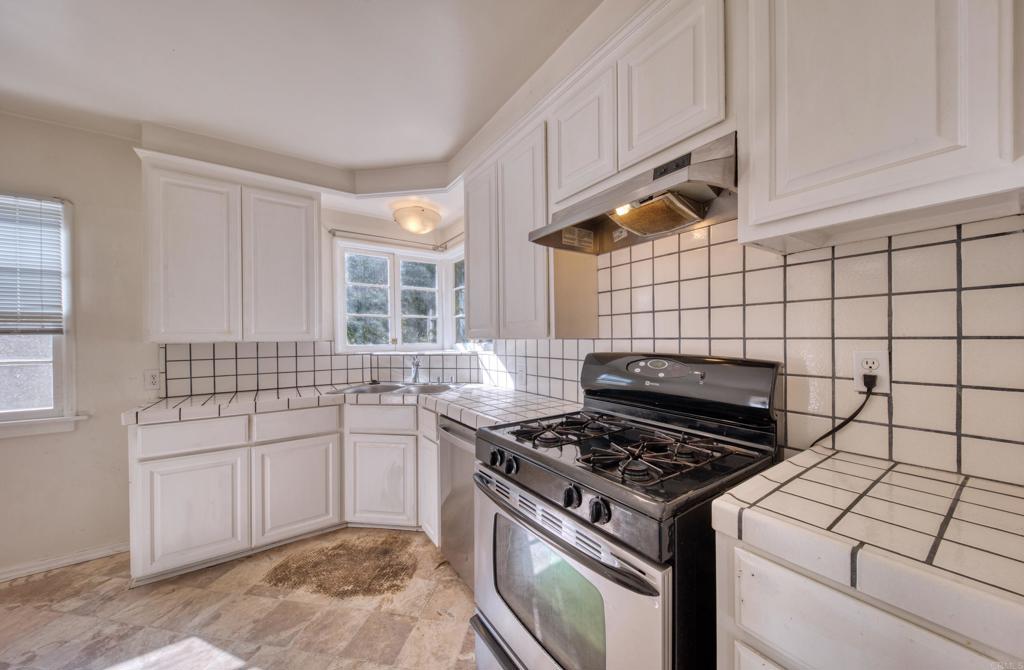 444 North Myrtle Avenue Monrovia, CA 91016 - Photo 13 of 37 a kitchen with a stove and a sink