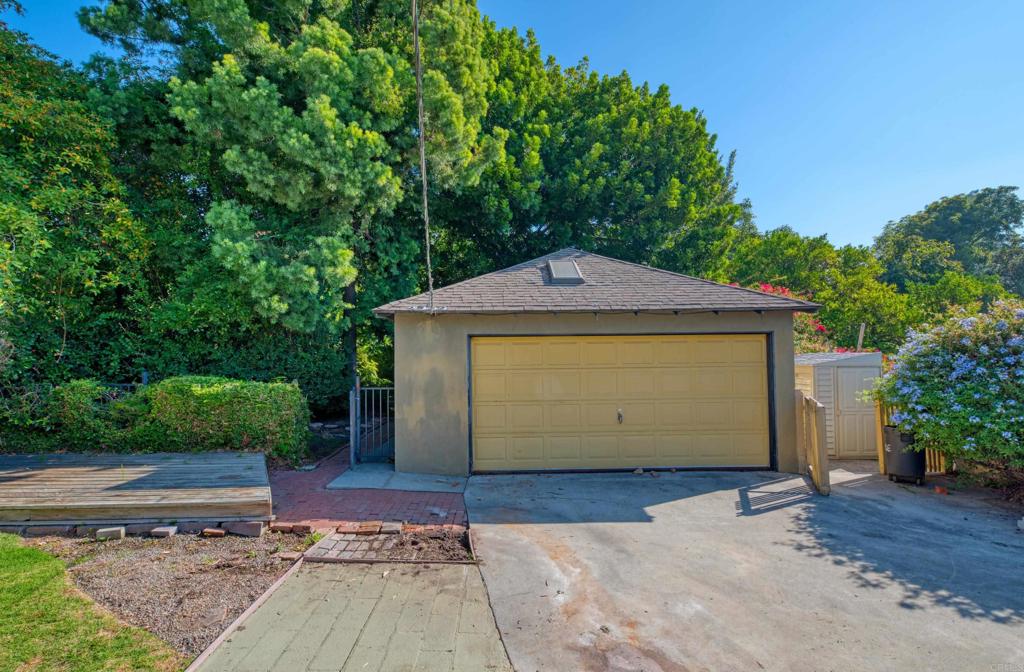 444 North Myrtle Avenue Monrovia, CA 91016 - Photo 24 of 37 a front view of a house with a yard and garage