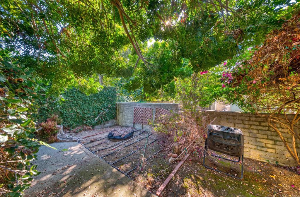 444 North Myrtle Avenue Monrovia, CA 91016 - Photo 33 of 37 a view of a backyard with chairs and a potted plant