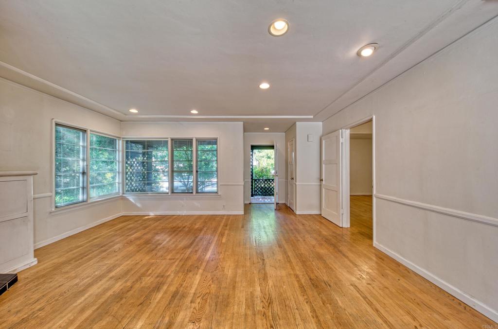 444 North Myrtle Avenue Monrovia, CA 91016 - Photo 4 of 37 a view of an empty room with wooden floor and a window