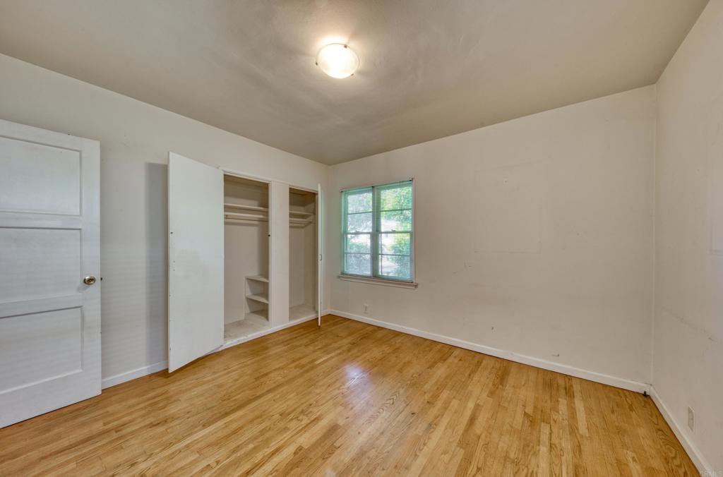 444 North Myrtle Avenue Monrovia, CA 91016 - Photo 7 of 37 wooden floor in an empty room with a window