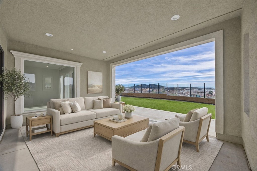 20638 Deer Grass Court Porter Ranch, CA 91326 - Photo 1 of 50 a living room with furniture and a large window