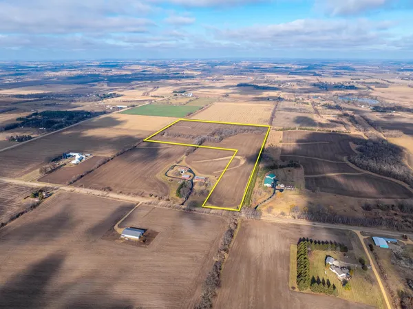 an empty room with wooden floor