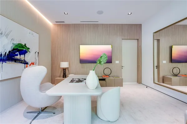 a view of a dining room with furniture