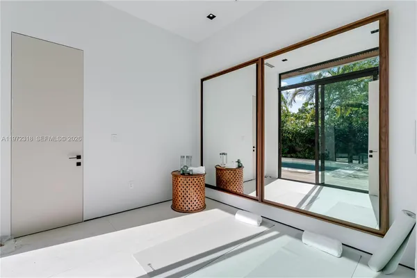 a view of an empty room and window