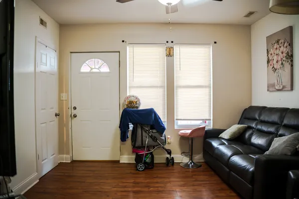 a living room with furniture and a window