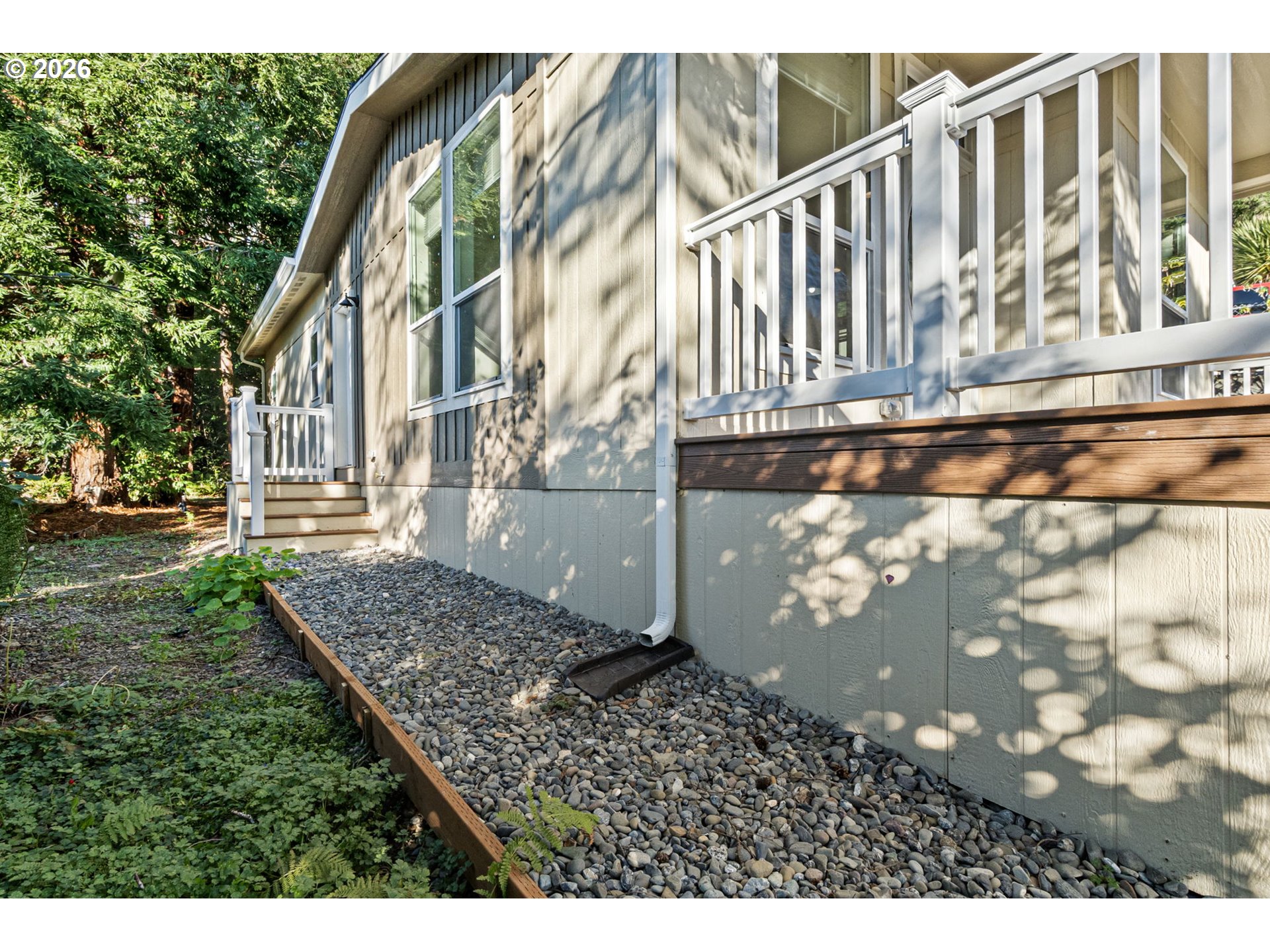 98041 Hallway Road, Unit 19 Brookings, OR 97415 - Photo 17 of 20 a view of building with yard