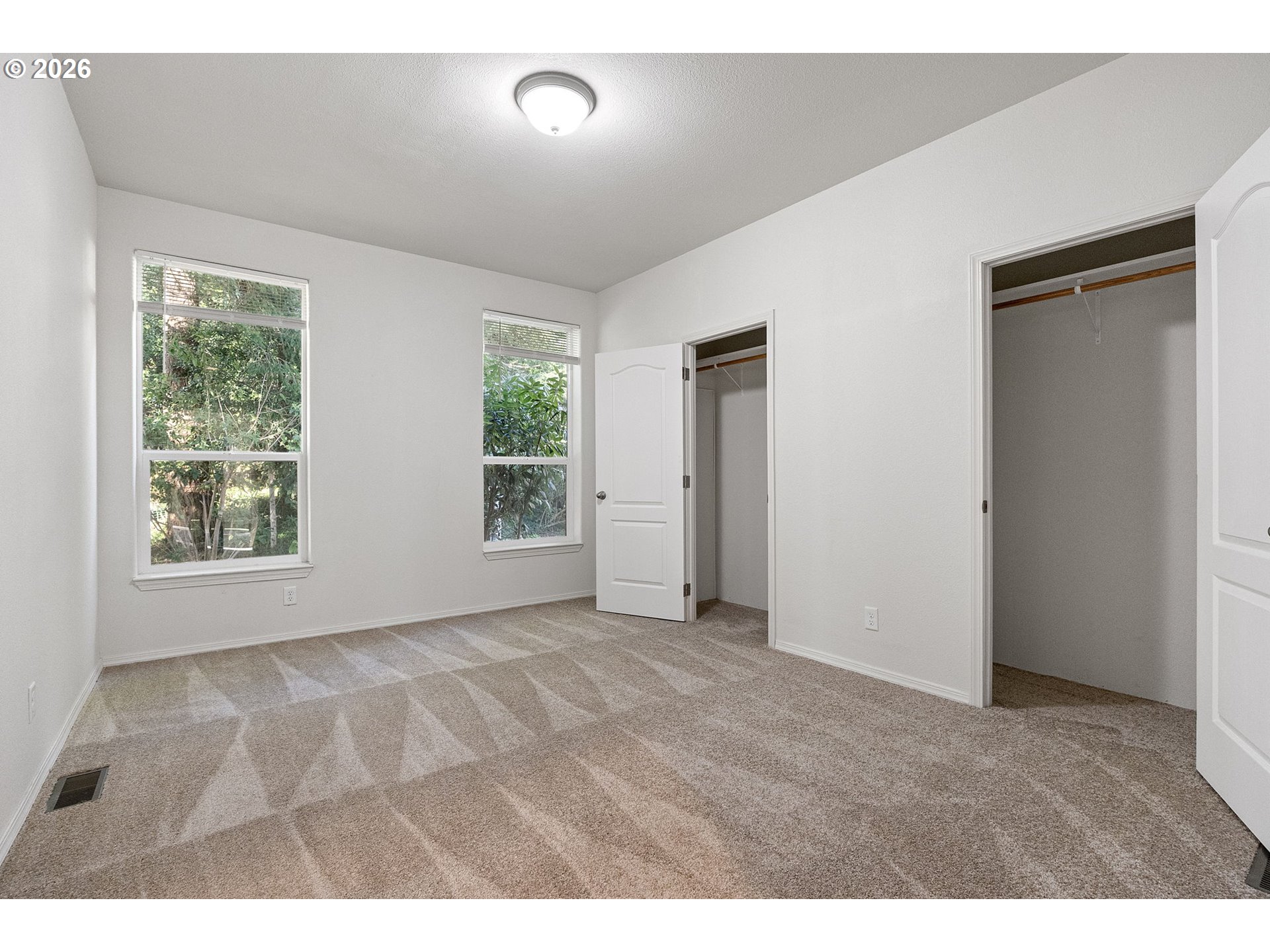 98041 Hallway Road, Unit 19 Brookings, OR 97415 - Photo 9 of 20 a view of an empty room with a window