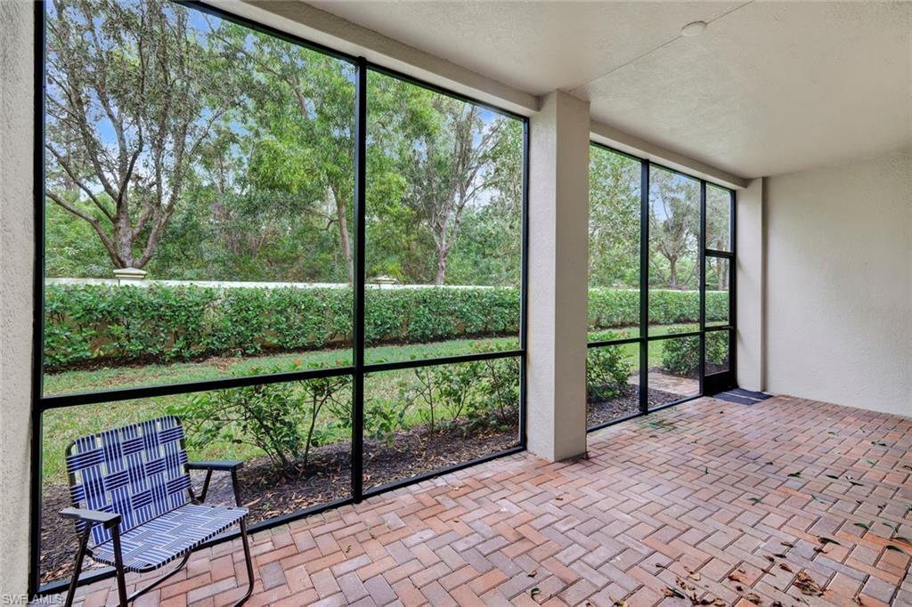 6526 Monterey Point, Unit 101 Naples, FL 34105 - Photo 18 of 20 a view of a room with a large window