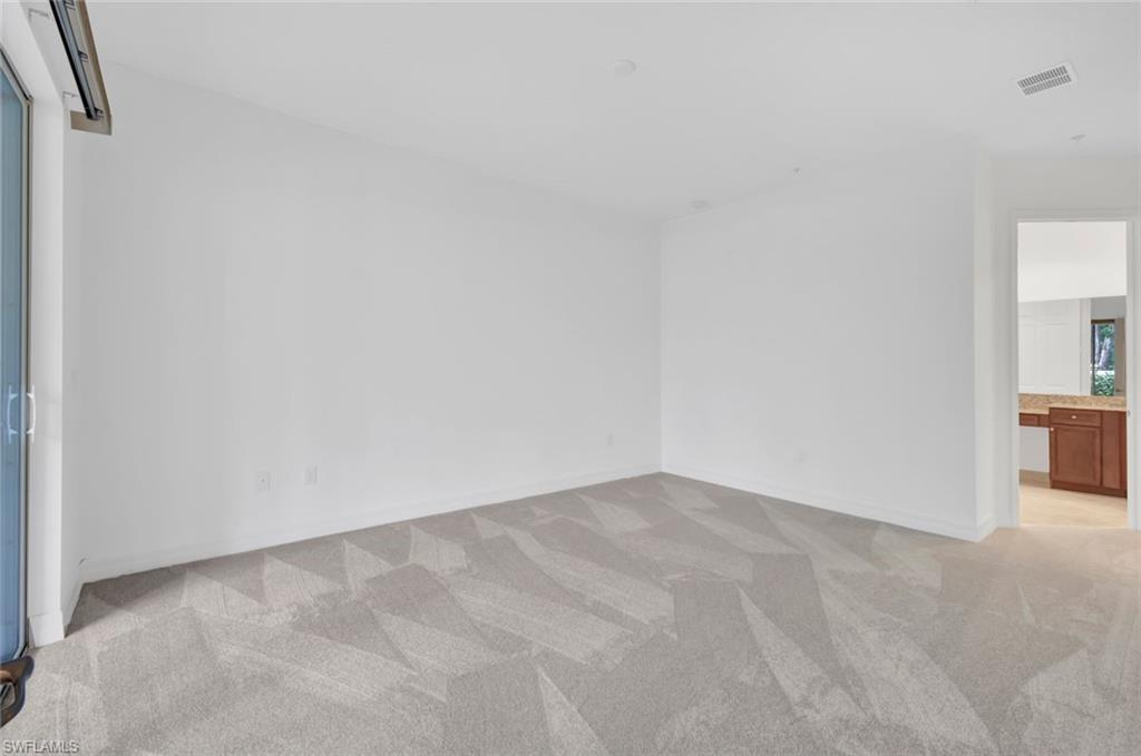 6526 Monterey Point, Unit 101 Naples, FL 34105 - Photo 10 of 20 a view of an empty room