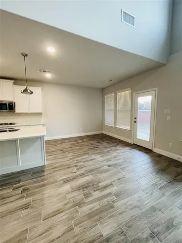 a view of a kitchen with a sink