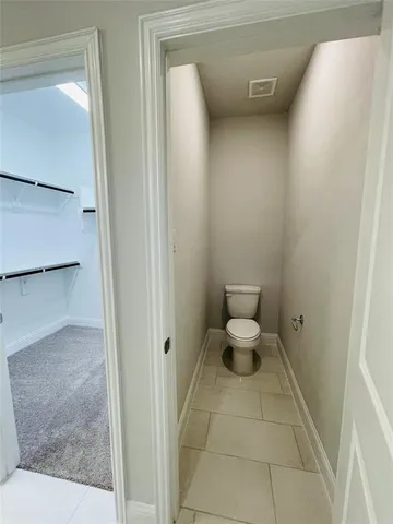 a bathroom with a toilet
