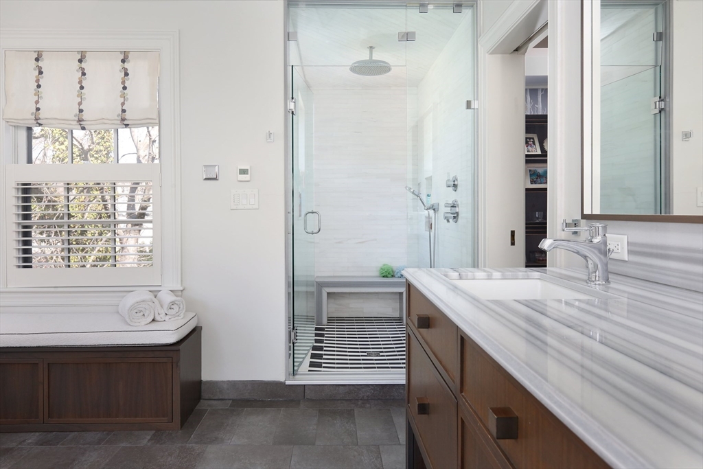 39 Worthington Road Brookline, MA 02446 - Photo 20 of 40 a bathroom with a sink double vanity and a bathtub