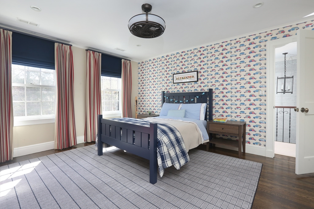 39 Worthington Road Brookline, MA 02446 - Photo 25 of 40 a bedroom with a bed and a window