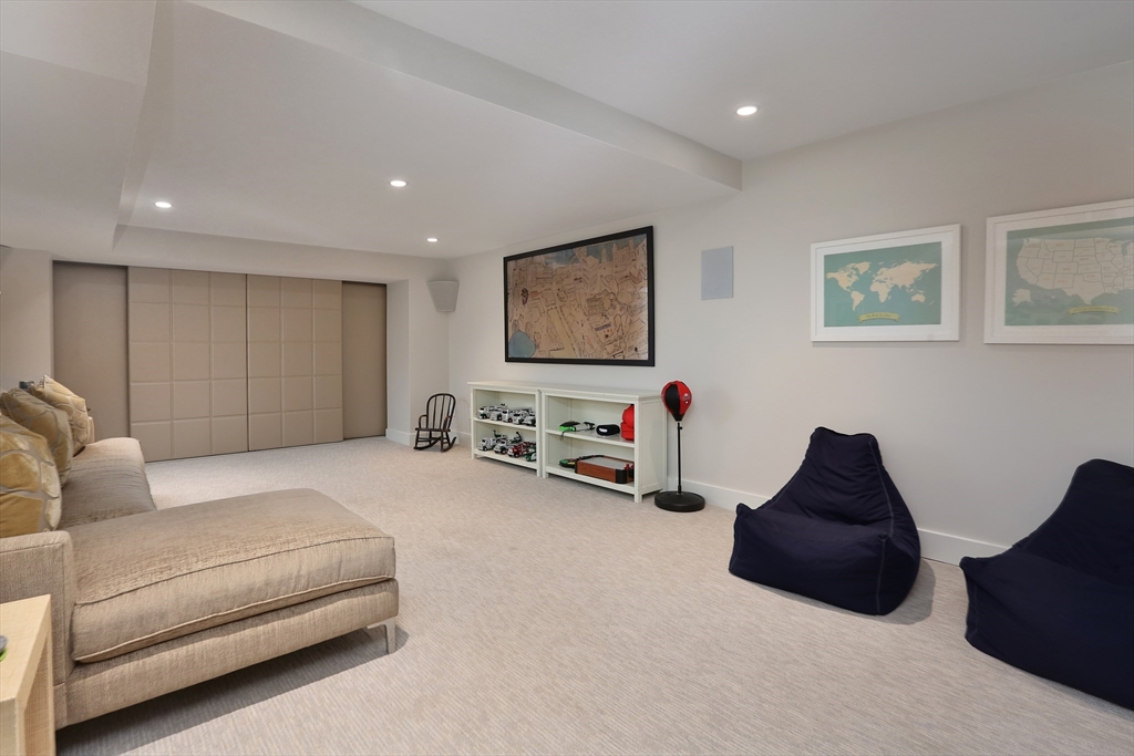 39 Worthington Road Brookline, MA 02446 - Photo 30 of 40 a living room with furniture and a couch