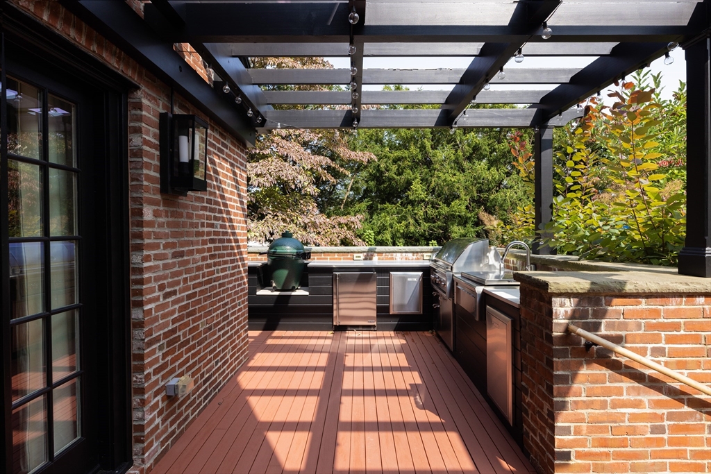 39 Worthington Road Brookline, MA 02446 - Photo 36 of 40 a view of a balcony with chairs