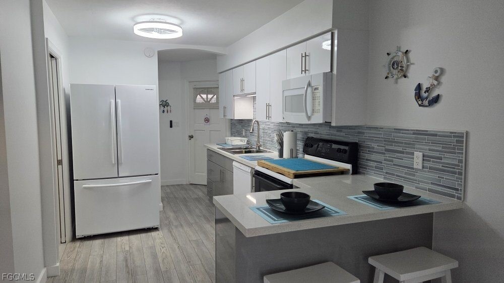 3211 Stringfellow Road, Unit 105 St. James City, FL 33956 - Photo 11 of 47