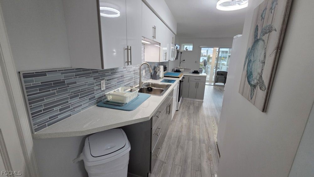 3211 Stringfellow Road, Unit 105 St. James City, FL 33956 - Photo 12 of 47