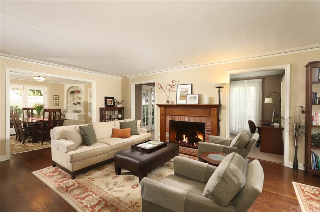 206 Sierra View Road Pasadena, CA 91105 - Photo 14 of 46 a living room with furniture and a fireplace