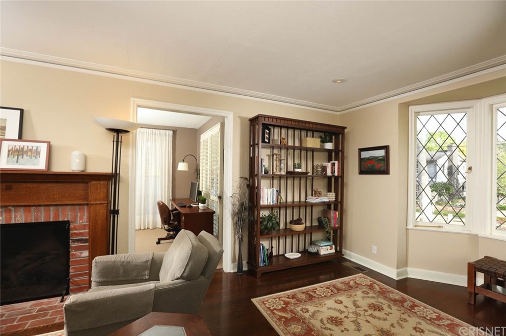 206 Sierra View Road Pasadena, CA 91105 - Photo 18 of 46 a living room with furniture and a fireplace