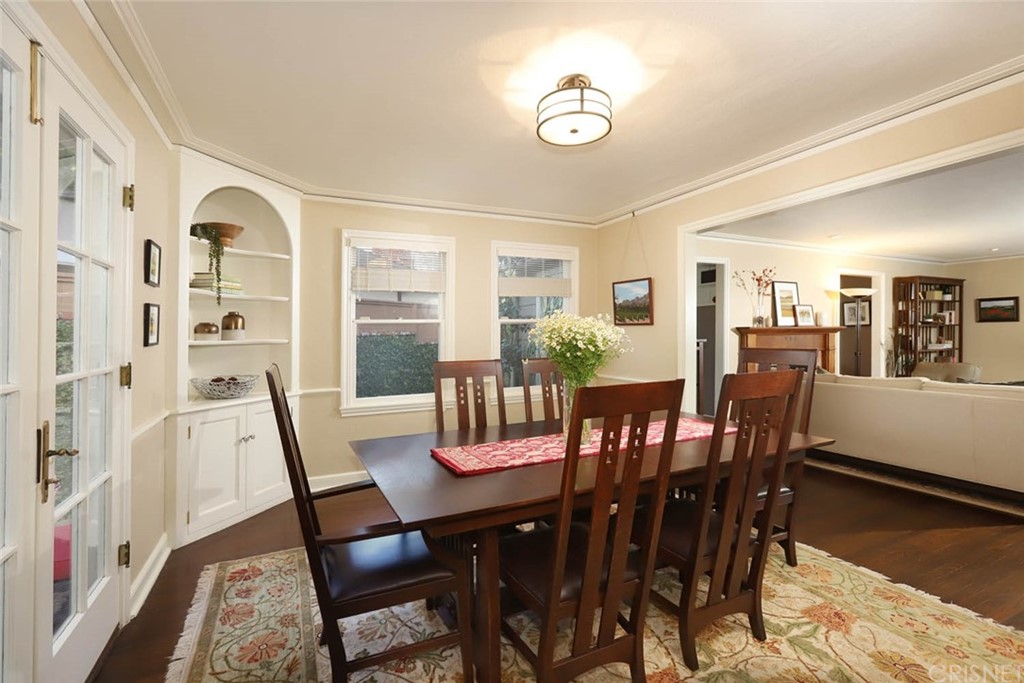 206 Sierra View Road Pasadena, CA 91105 - Photo 19 of 46 a view of a dining room with furniture window and wooden floor