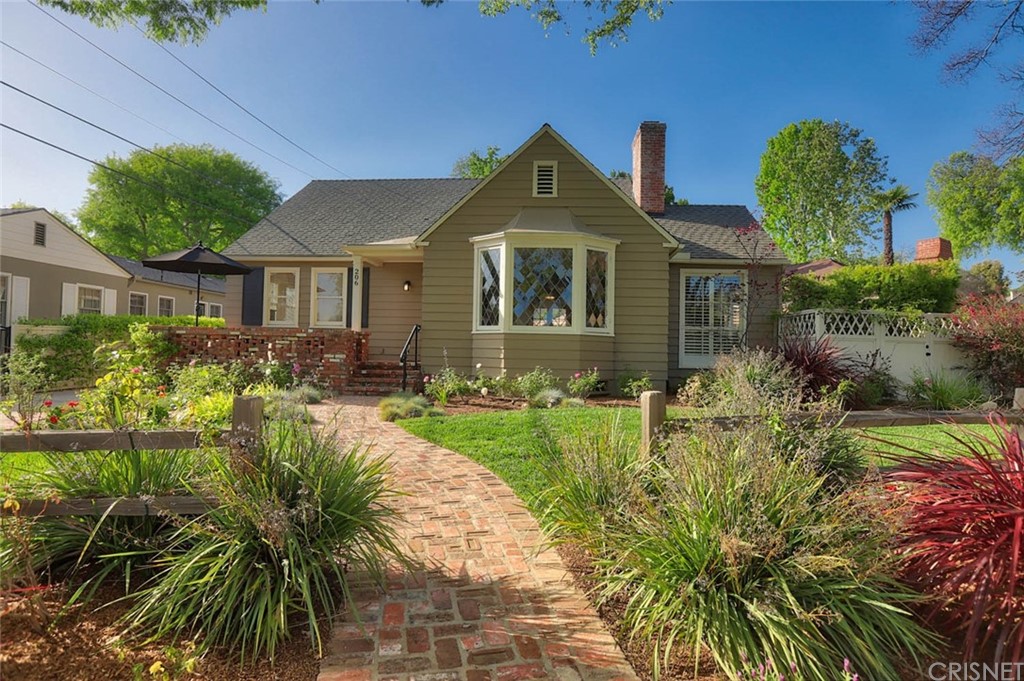 206 Sierra View Road Pasadena, CA 91105 - Photo 3 of 46 a front view of a house with a yard