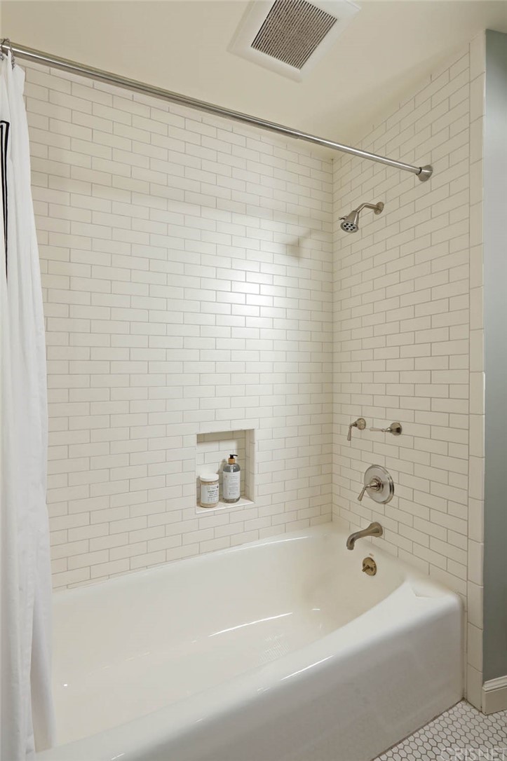 206 Sierra View Road Pasadena, CA 91105 - Photo 31 of 46 a bathroom with a shower and a bath tub