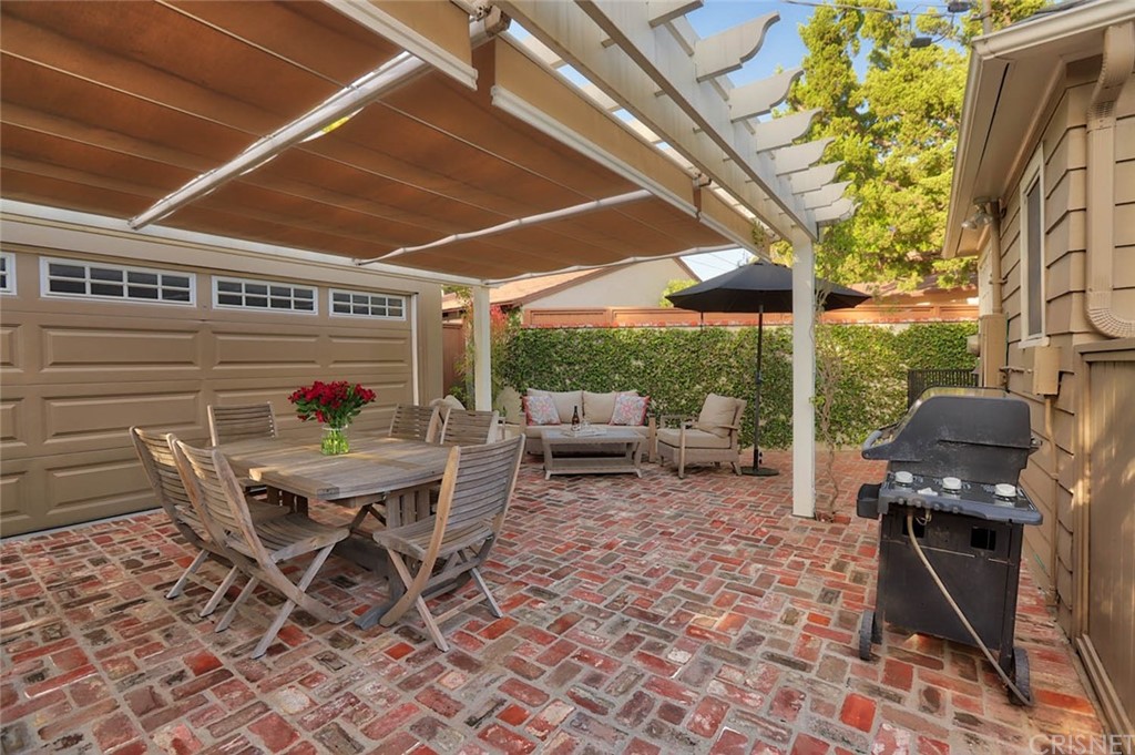 206 Sierra View Road Pasadena, CA 91105 - Photo 45 of 46 a view of a backyard with a patio and outdoor seating