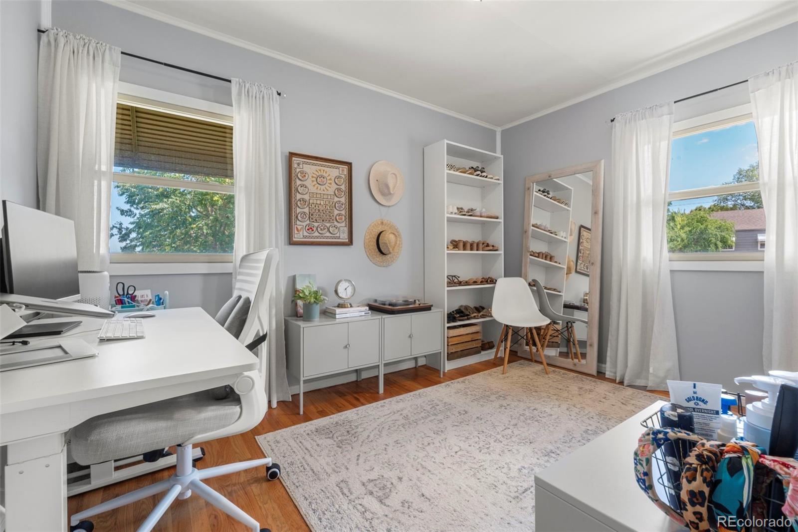 1845 South Mabry Way Denver, CO 80219 - Photo 11 of 20 a workspace with furniture and a window