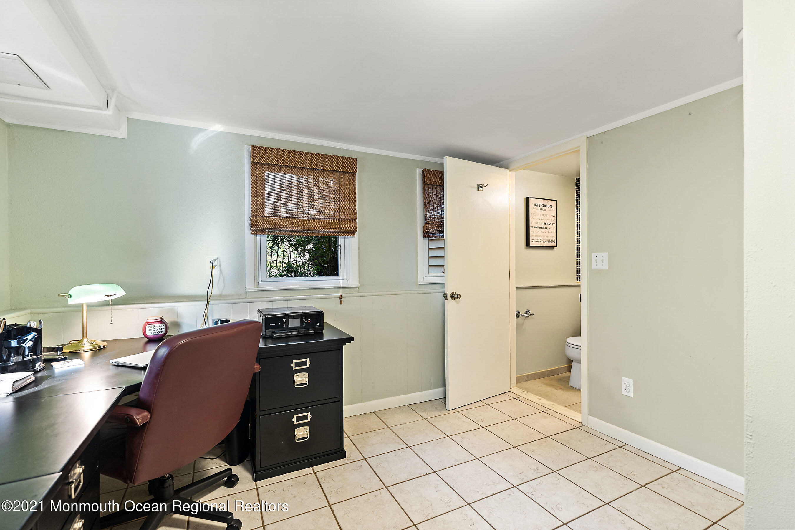 105 Bruce Road Red Bank, NJ 07701 - Photo 18 of 26 a view of a workspace with furniture and window