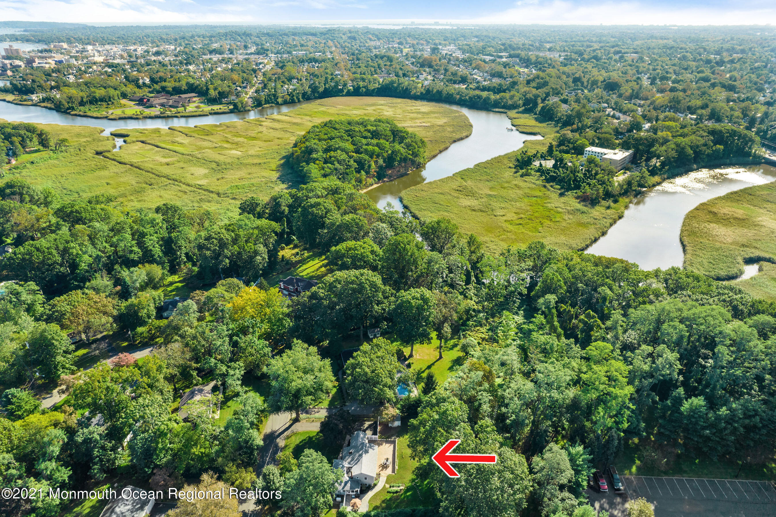105 Bruce Road Red Bank, NJ 07701 - Photo 25 of 26 an aerial view of lake residential house with outdoor space and swimming pool