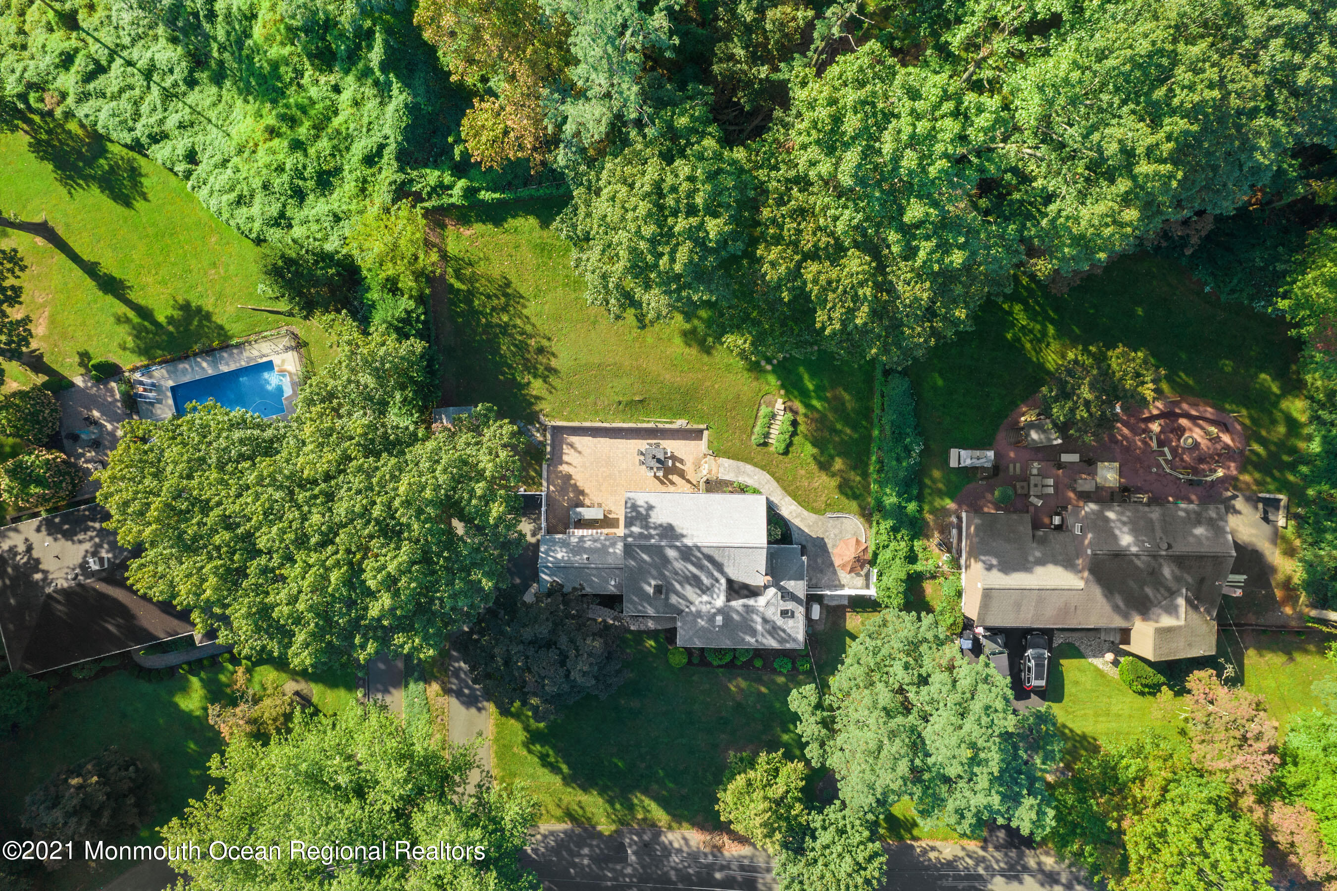 105 Bruce Road Red Bank, NJ 07701 - Photo 26 of 26 an aerial view of residential house with outdoor space and trees all around