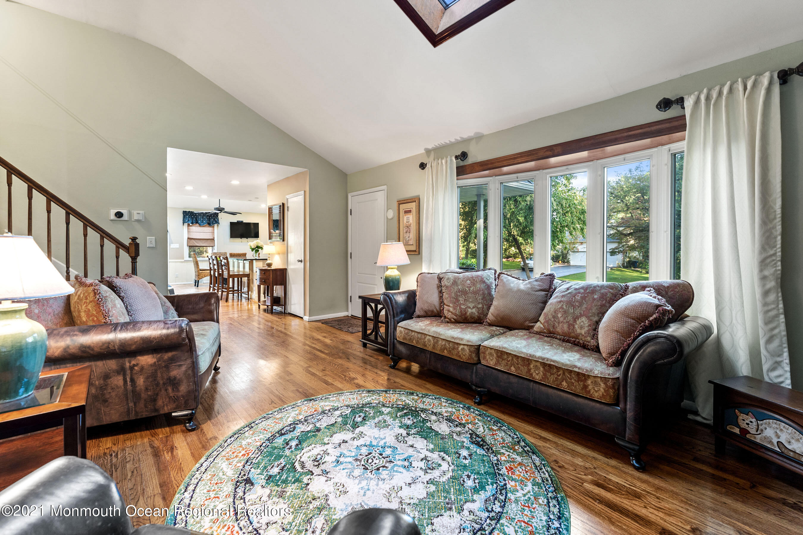 105 Bruce Road Red Bank, NJ 07701 - Photo 5 of 26 a living room with furniture and a large window