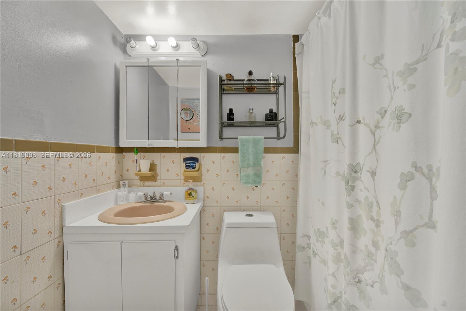 829 Southwest 19th Avenue Miami, FL 33135 - Photo 25 of 54 a bathroom with a sink a toilet and shower