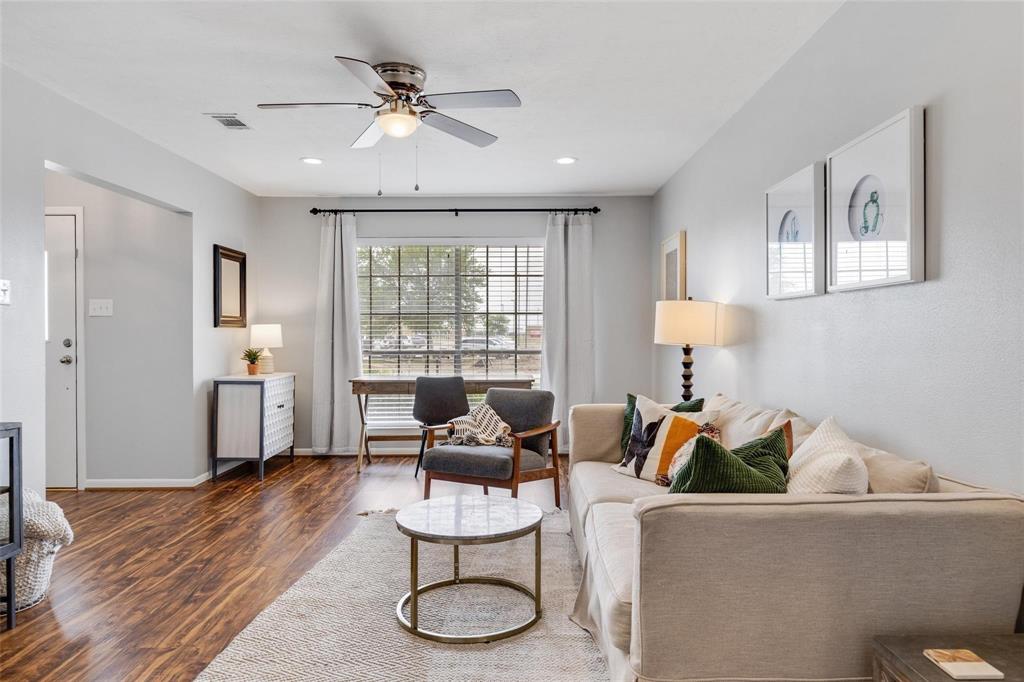 607 West Cedar Street Celina, TX 75009 - Photo 9 of 26 a living room with furniture and a wooden floor