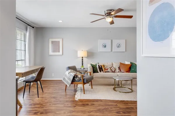a living room with furniture and a window