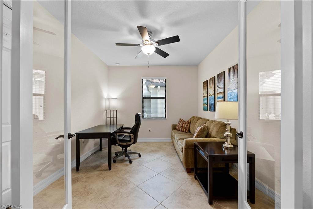 9254 Veneto Place Naples, FL 34113 - Photo 15 of 30 Office featuring ceiling fan and light tile floors