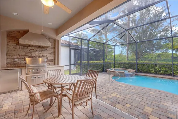 a view of a patio with a yard