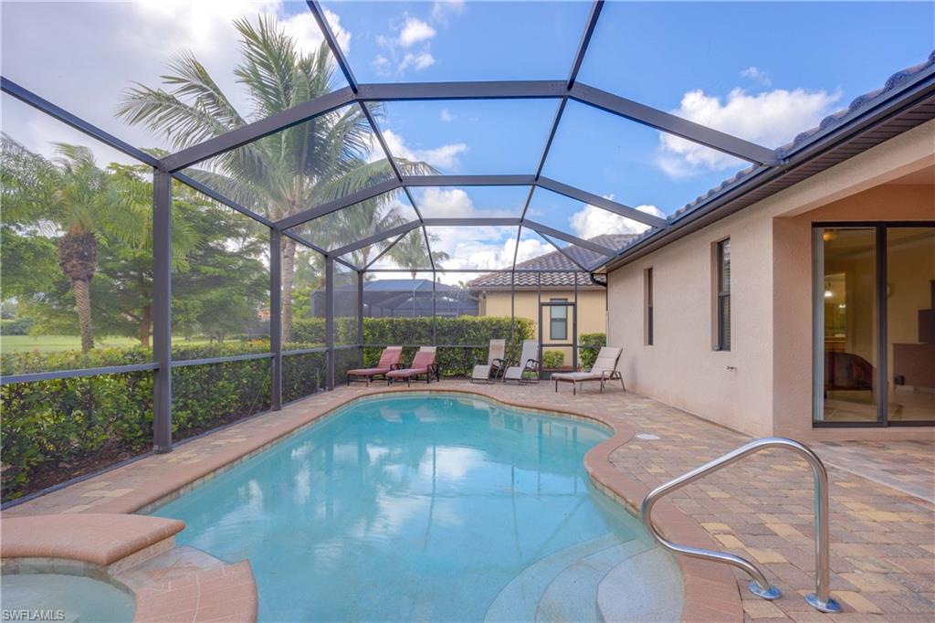 9254 Veneto Place Naples, FL 34113 - Photo 19 of 30 View of pool with a lanai and a patio area