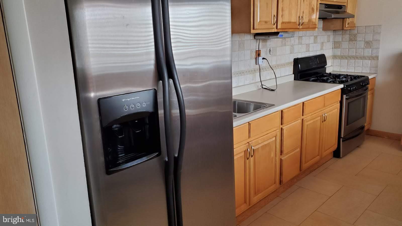 854 Woodlane Road Mount Holly, NJ 08060 - Photo 19 of 37 More of the floor in the kitchen,
