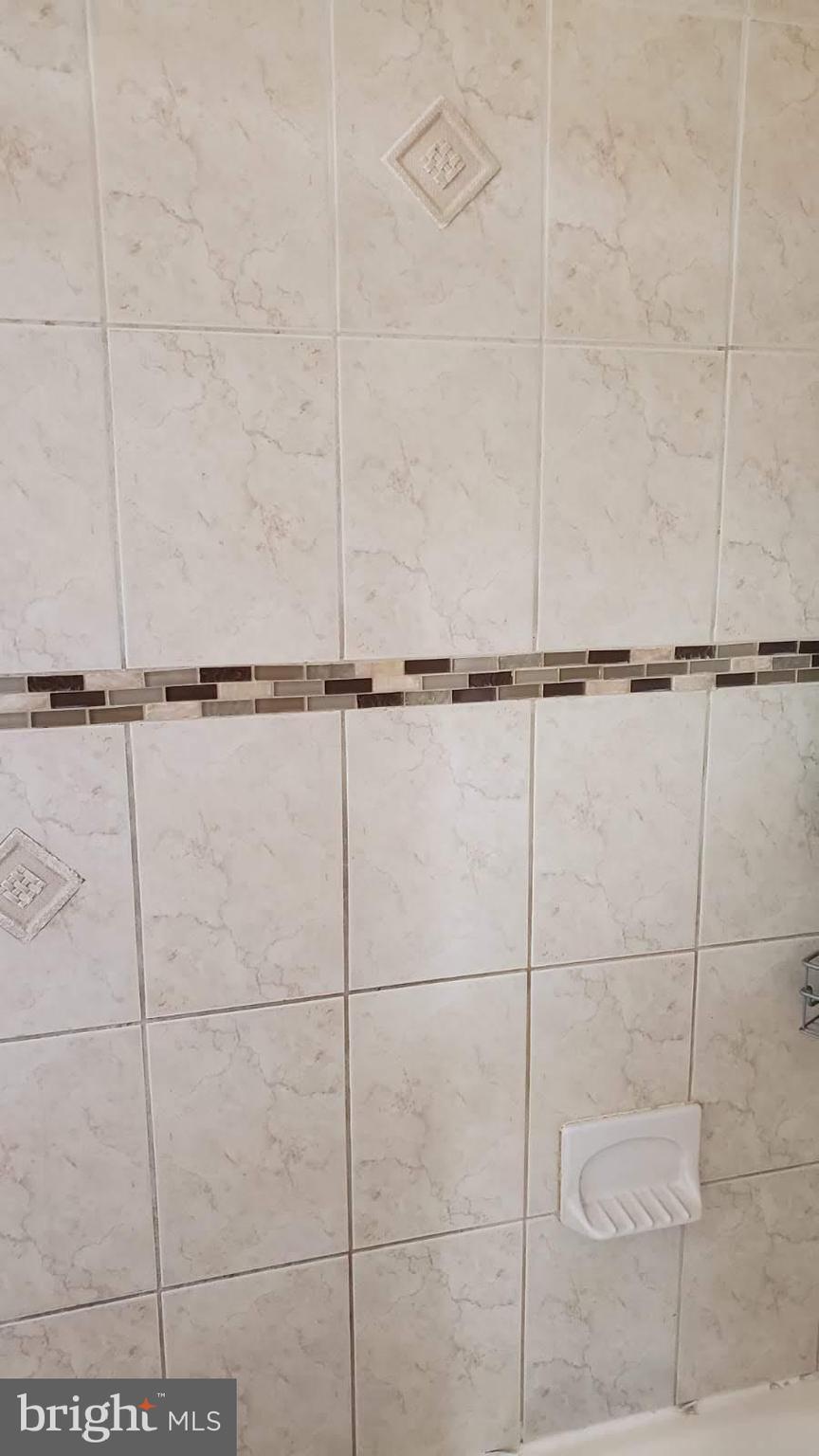 854 Woodlane Road Mount Holly, NJ 08060 - Photo 28 of 37 tile in the bath area.