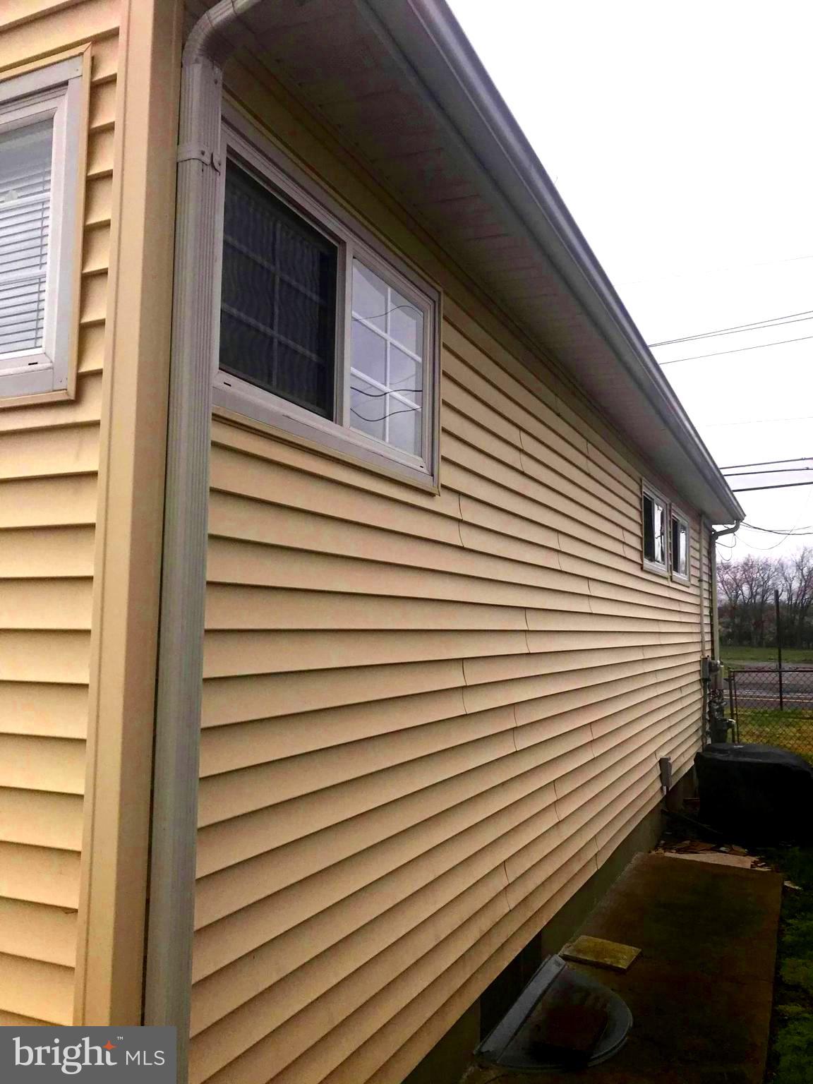 854 Woodlane Road Mount Holly, NJ 08060 - Photo 5 of 37 Vinyl siding is in good shape.