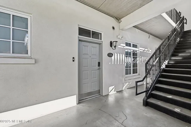 a view of entryway with stairs