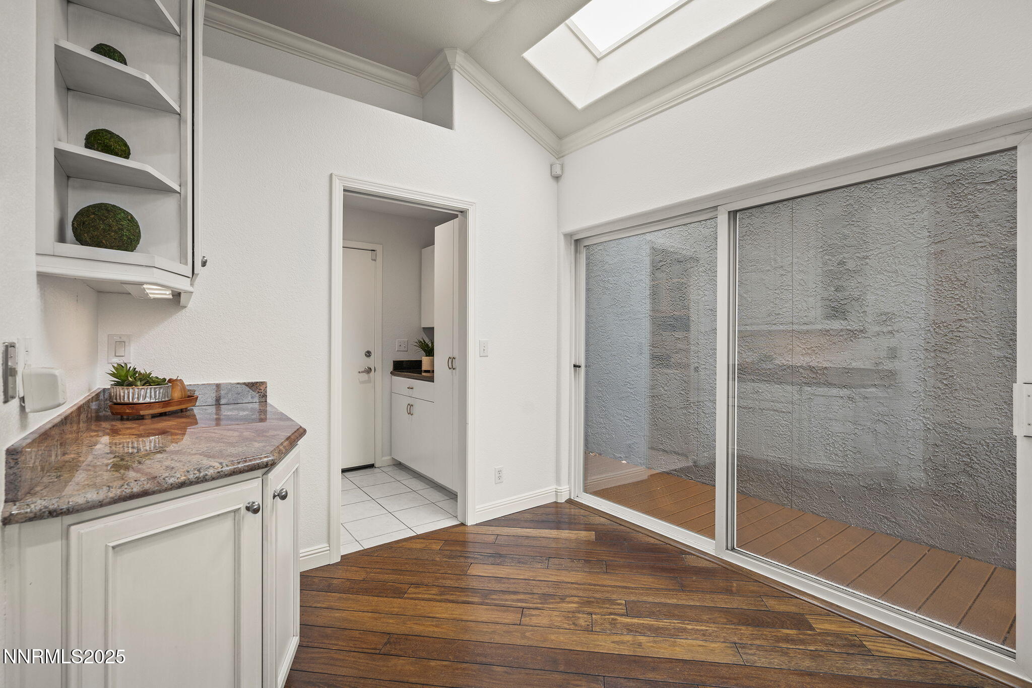 2636 Edgerock Road Reno, NV 89519 - Photo 18 of 54 a bathroom with a granite countertop sink a mirror and shower