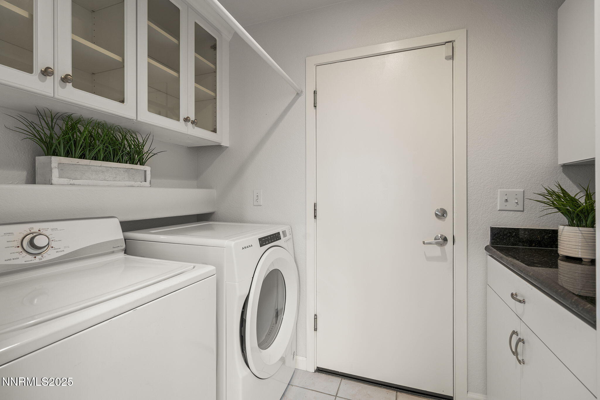 2636 Edgerock Road Reno, NV 89519 - Photo 19 of 54 a utility room with dryer and washer