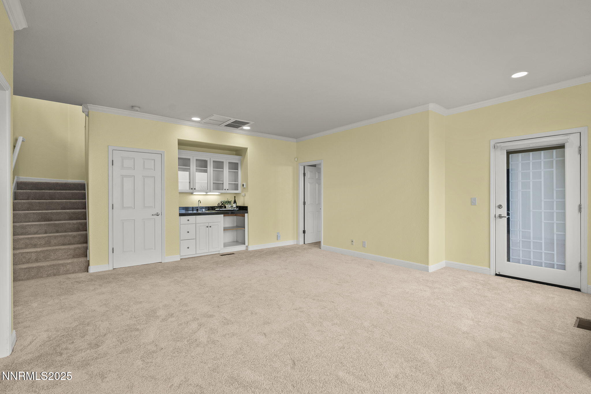 2636 Edgerock Road Reno, NV 89519 - Photo 26 of 54 a view of an empty room with kitchen and window