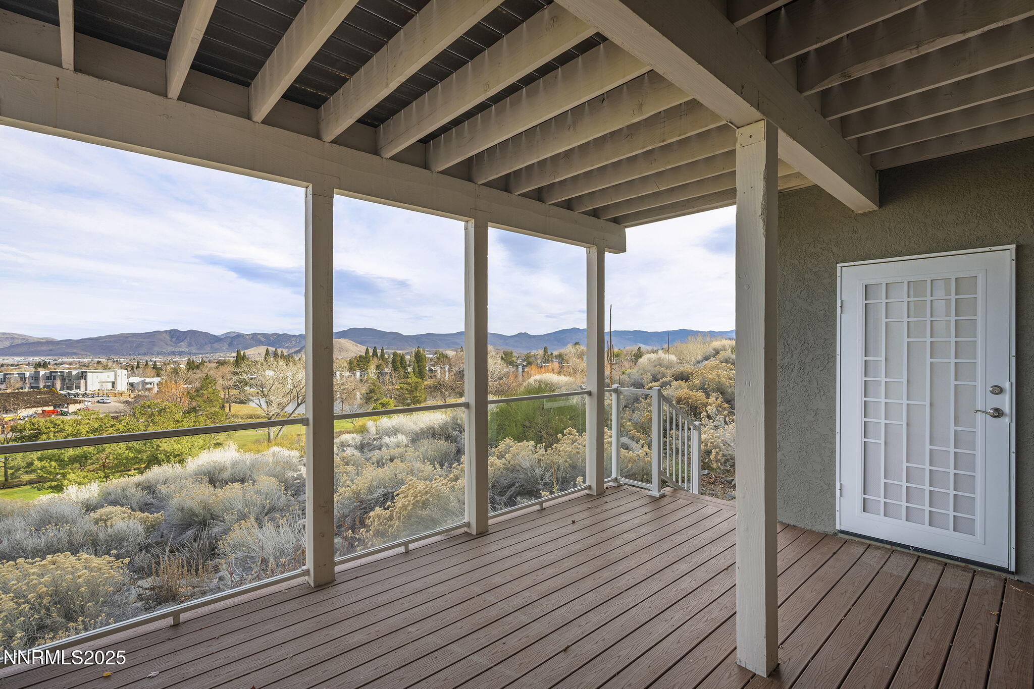 2636 Edgerock Road Reno, NV 89519 - Photo 45 of 54 a view of a balcony with wooden floor