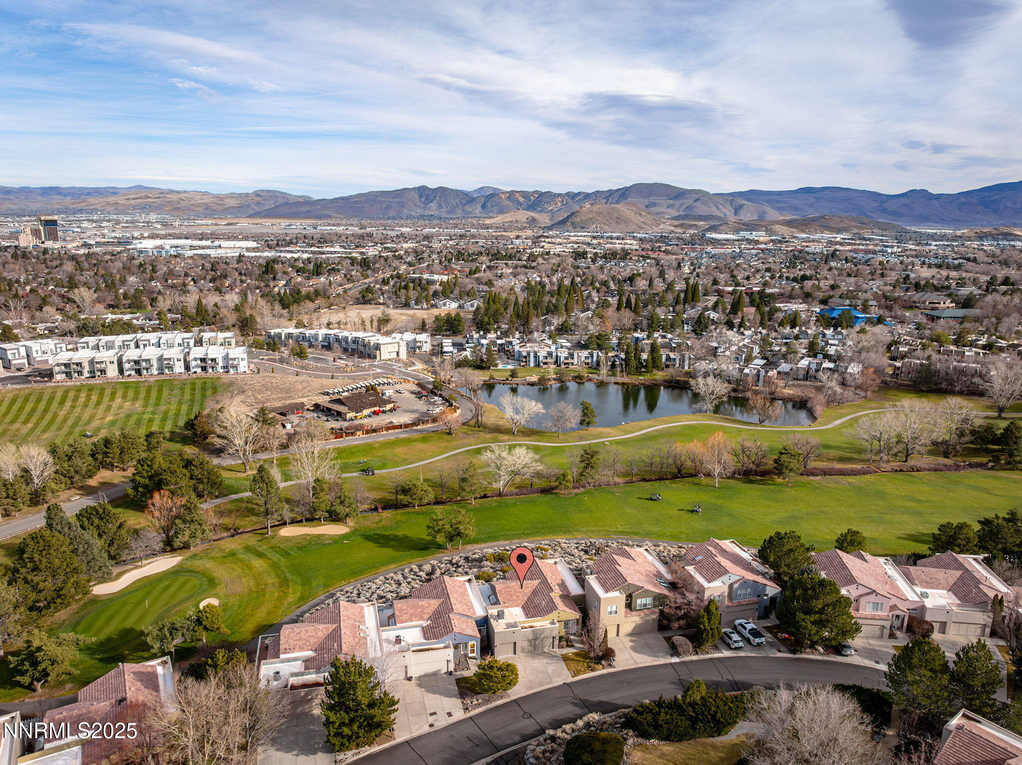 2636 Edgerock Road Reno, NV 89519 - Photo 49 of 54 an aerial view of a city with lots of residential buildings ocean and mountain view in back