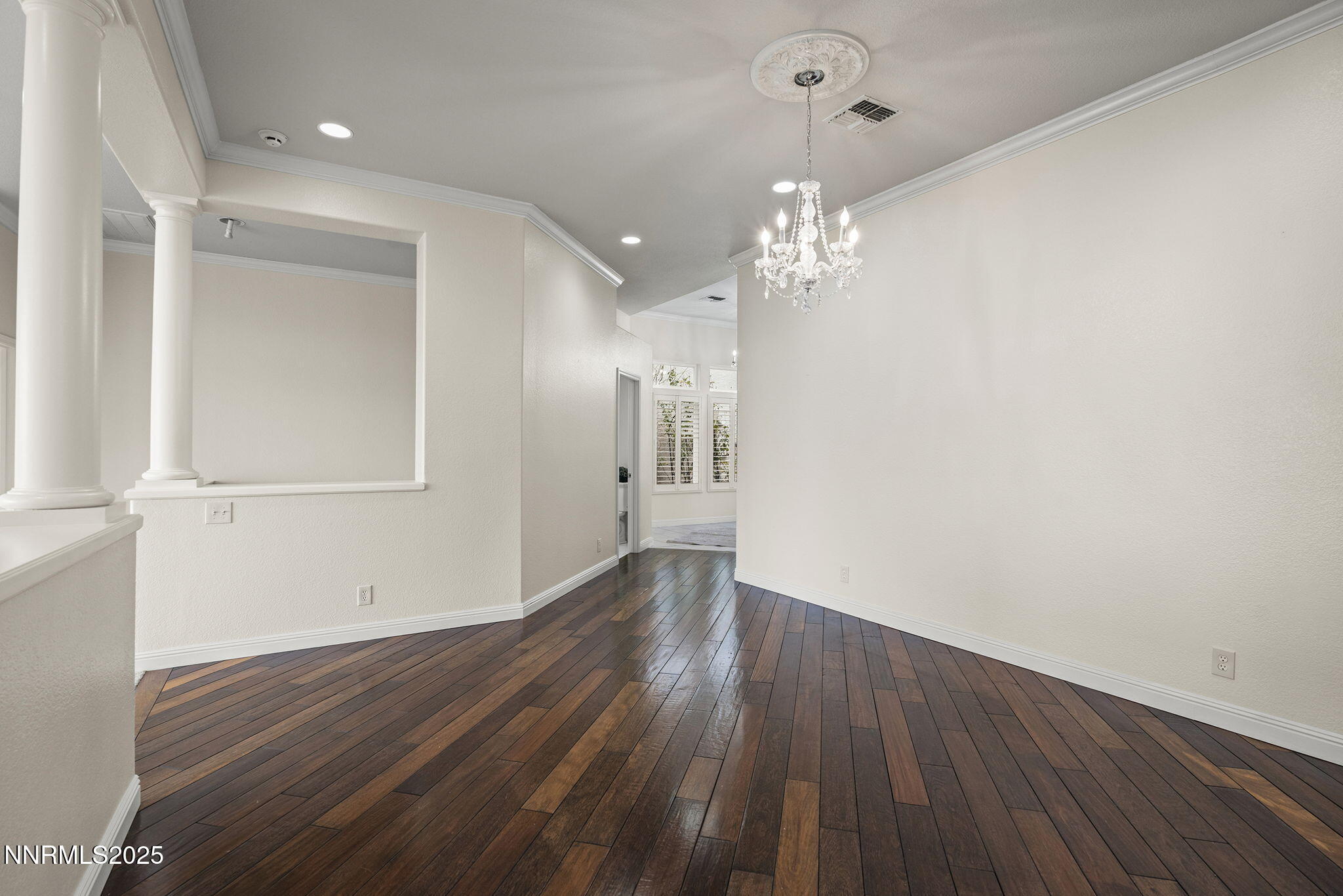 2636 Edgerock Road Reno, NV 89519 - Photo 10 of 54 wooden floor in an empty room with a window